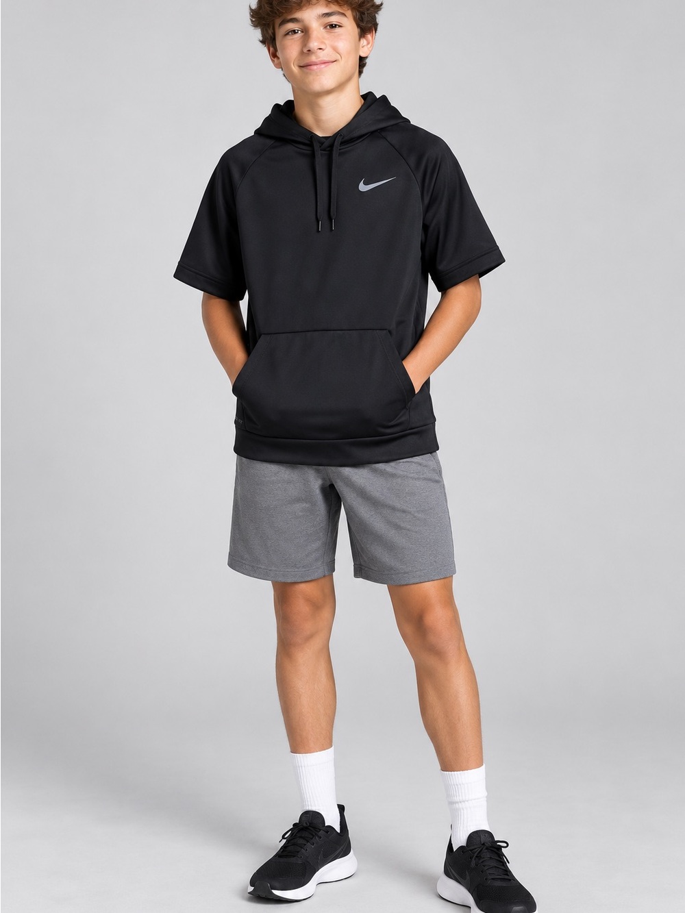 Nike Dri-FIT black short-sleeve pullover hoodie in kids/youth size XL.